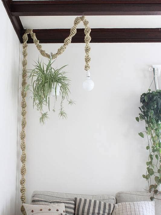 white living room with macrame wrapped bulb