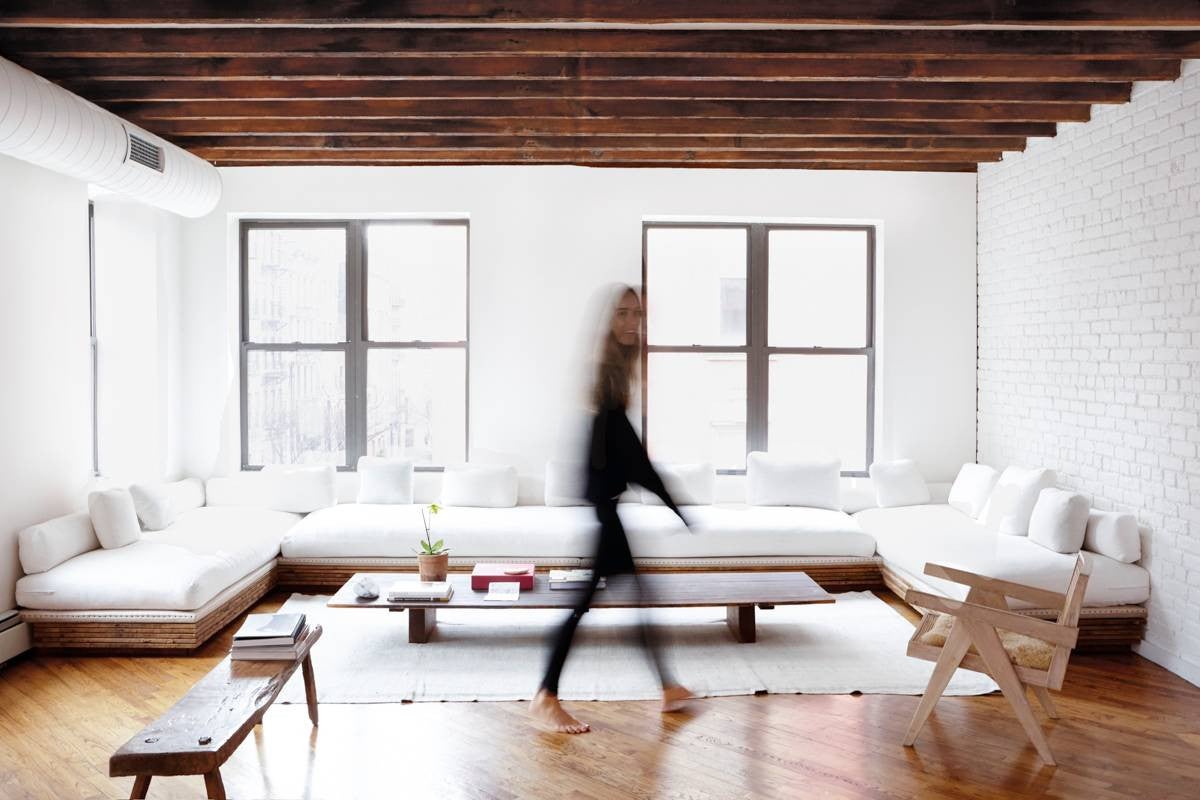 Daphne Javitch & Pali Xisto Cornelsen's Lower East Side Home White and Wood Living room