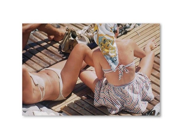 F0008-UF-ML000-600-two-women-sunbathing-on-decking-in-nice-france-in-august-1948-picture-id115097262