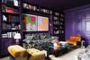 purple library with patterned sofa