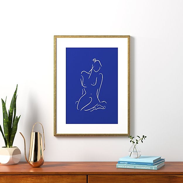 blue figure with gold frame
