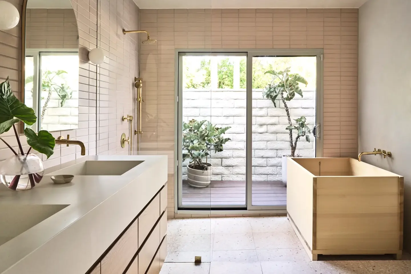 Bathroom with French doors outside and Japanese wood soaking tub.