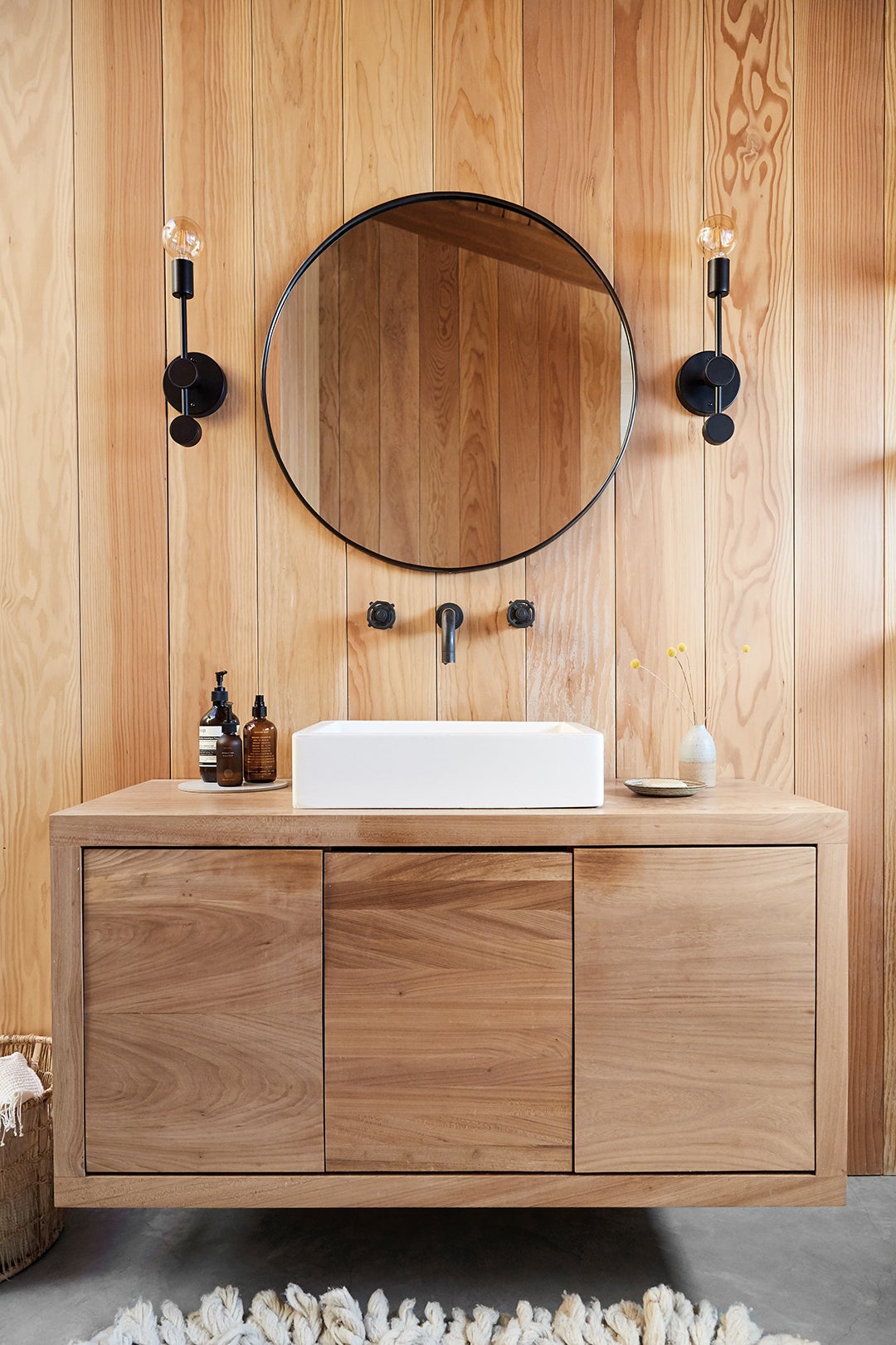 All-wood bathroom walls and floating vanity.