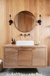 All-wood bathroom walls and floating vanity.