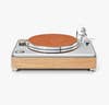 Silver and rose-gold record player with blonde wood finish