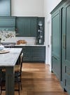 gray green kitchen cabinets with gray marble counters