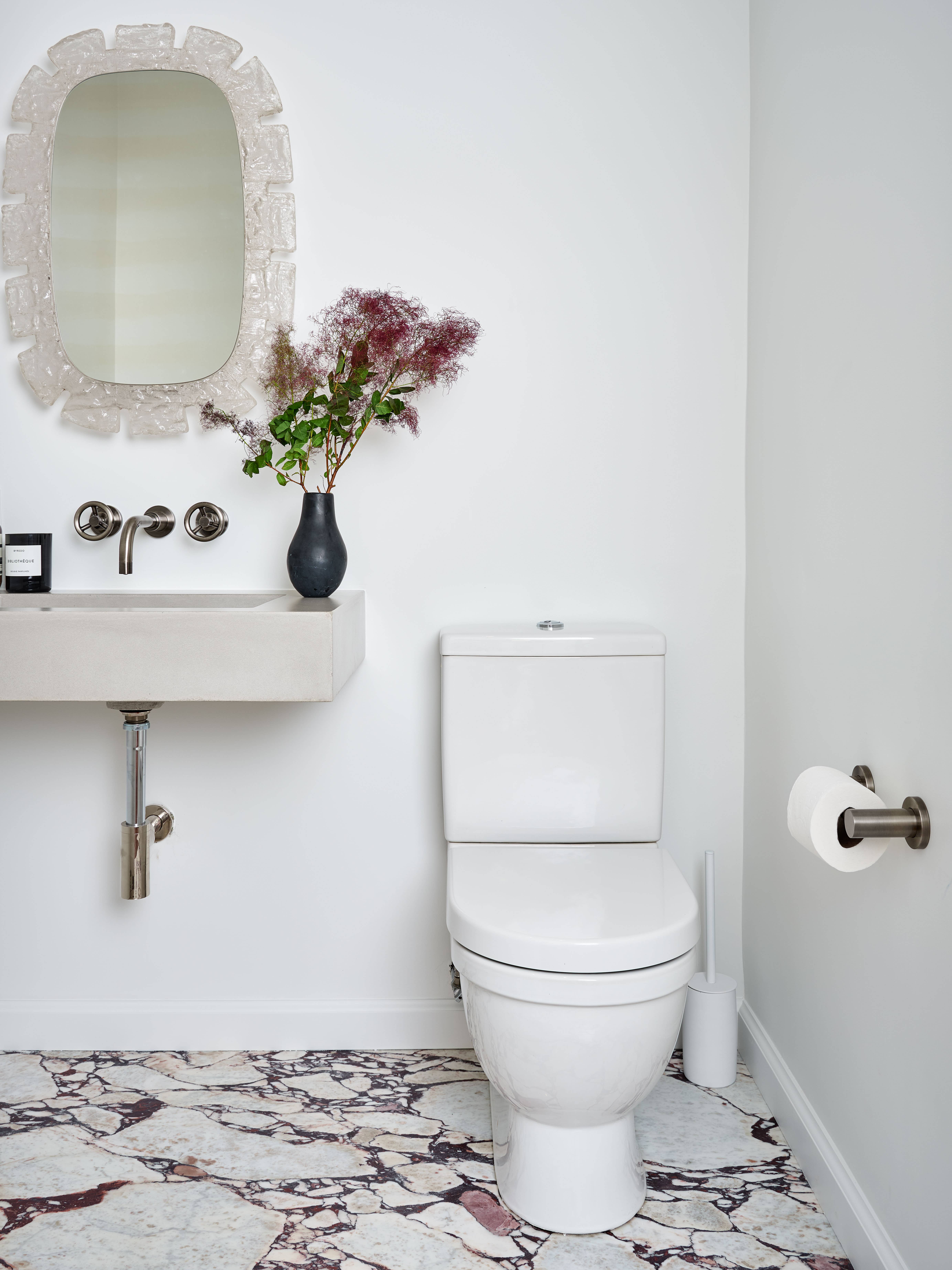 Two Tiny Bathroom Makeovers With One Stunning Marble Slab in Common