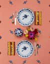 peach table linen with vintage blue plates