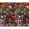 all over floral pattern with a black background and brightly colored flowers