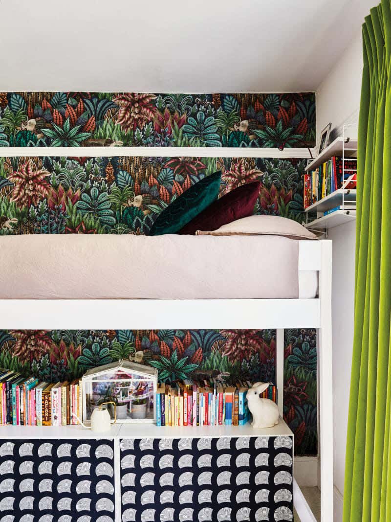 lofted kids bed with modern storage shelf below with fabric panels
