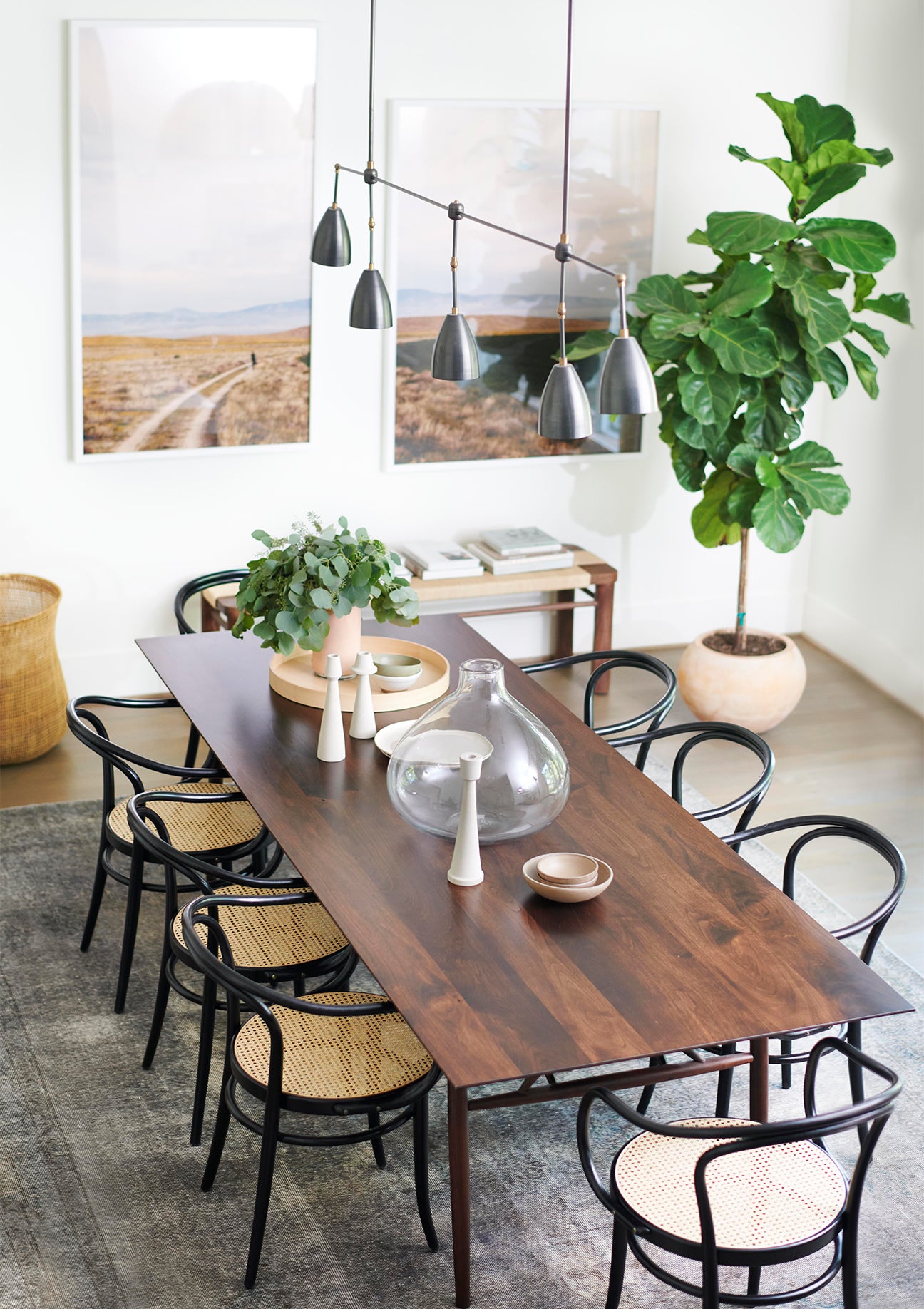 birds eye shot of 8 person dining table with cane chairs