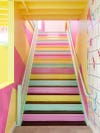 pastel pink, green, and yellow painted stairs