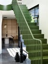 moss green staircase in a contemporary home