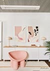 pink faye toogood chair in front of a white ikea credenza