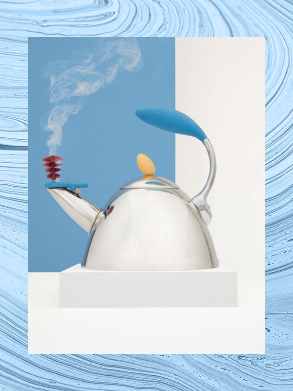 teapot on a blue background of fabric