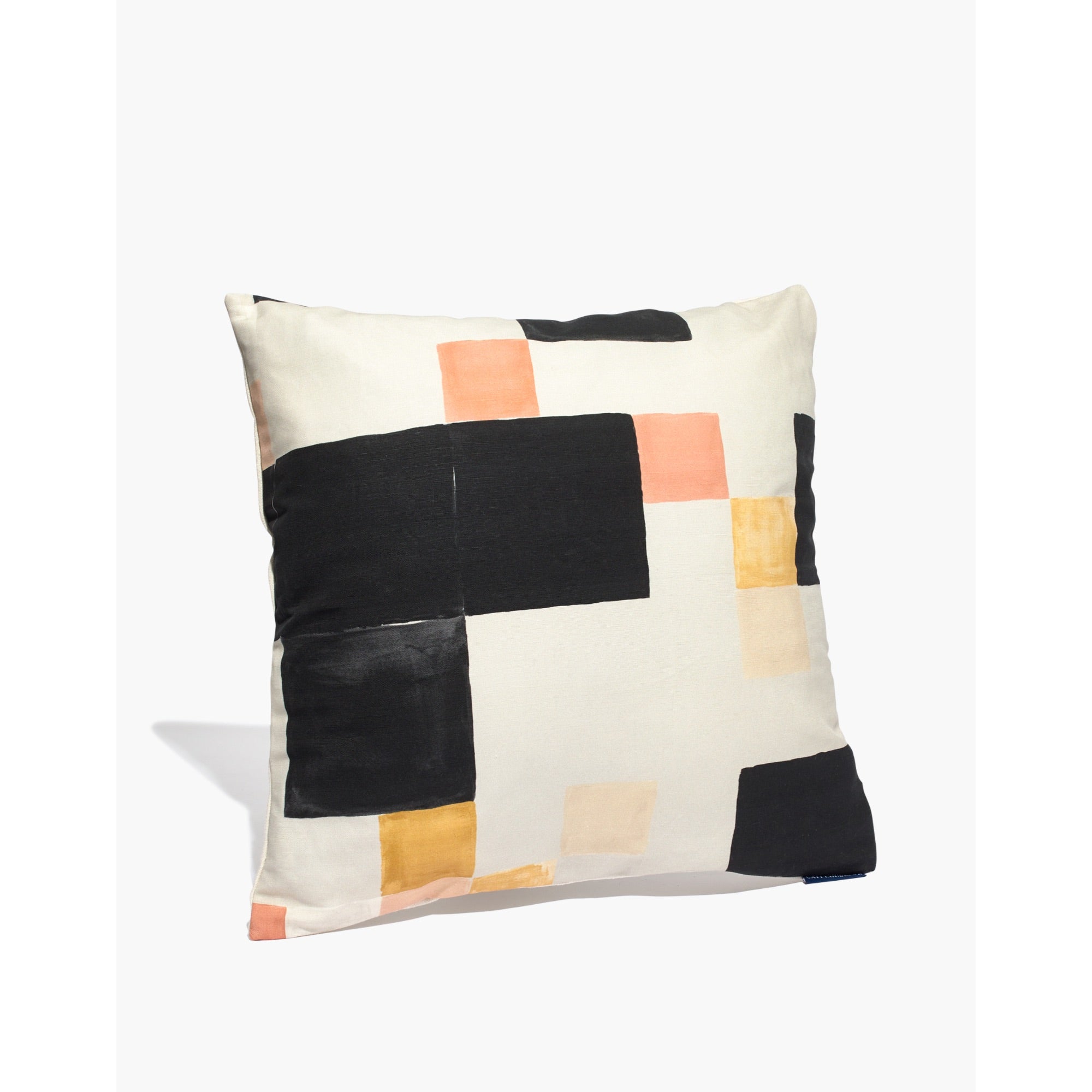 graphic pillow with pink and black squares