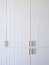 slatted wood white cabinet doors