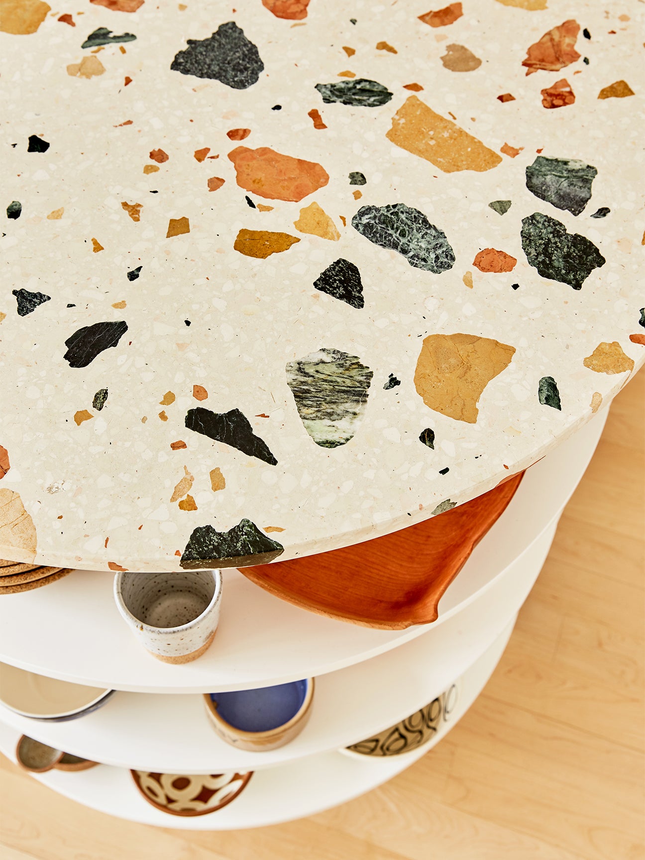close up of orange and green terrazzo kitchen counters