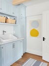 baby blue laundry room cabinets
