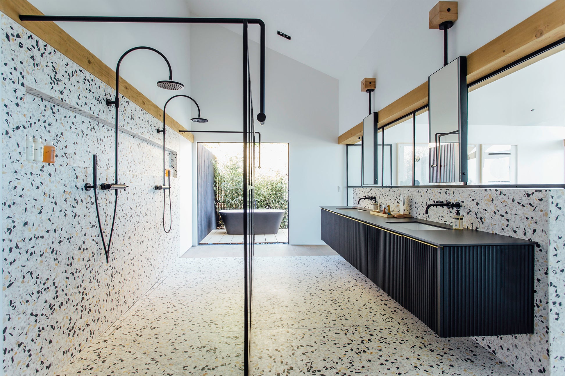 double shower with terrazzo walls