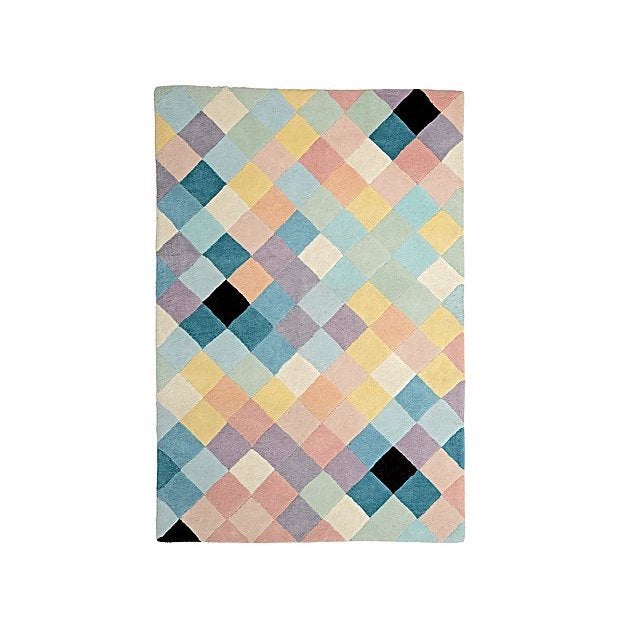 rug design with small colorful square 'pixels'