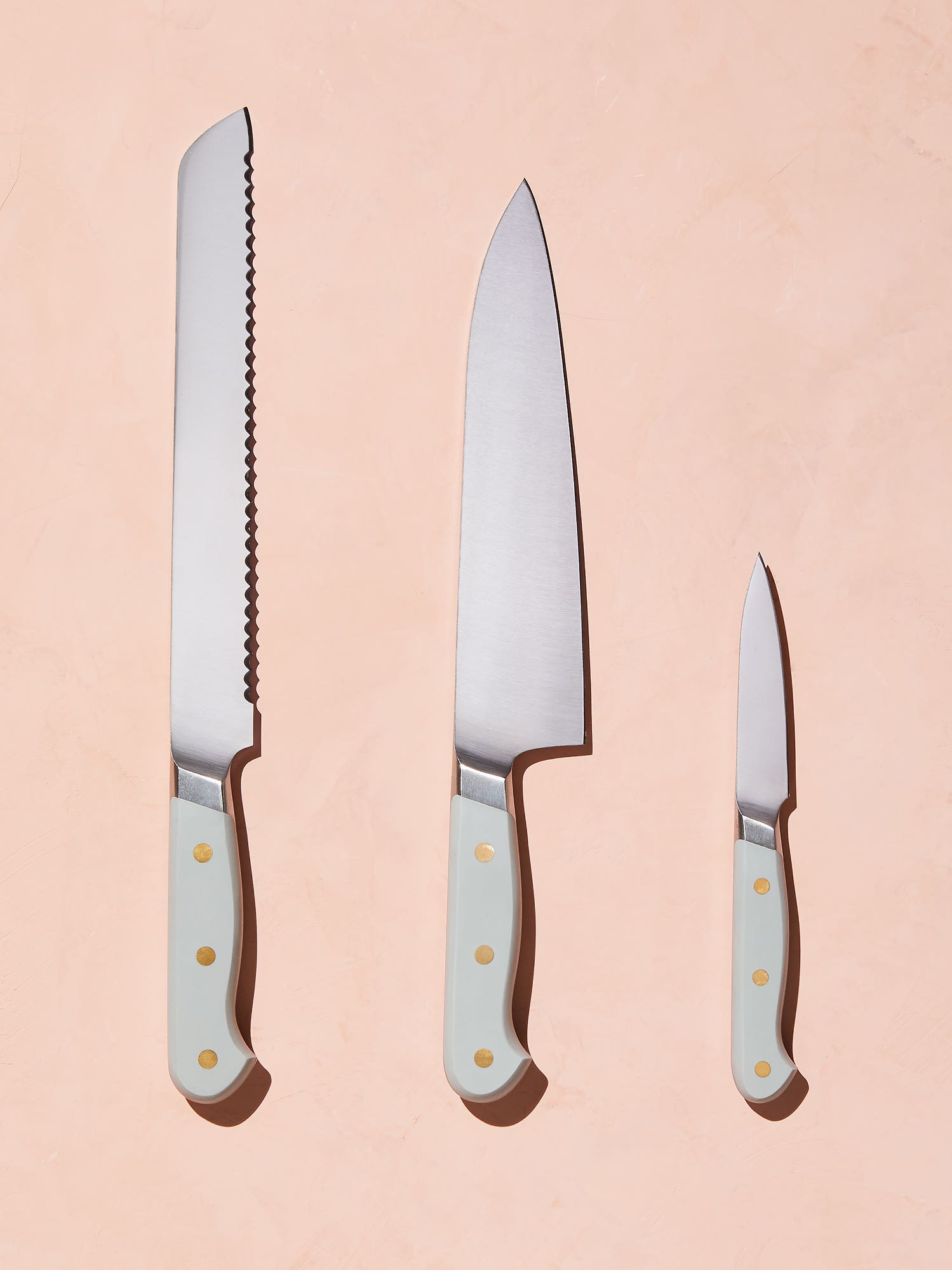 knives-pink-background
