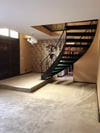Exposed staircase to basement. 