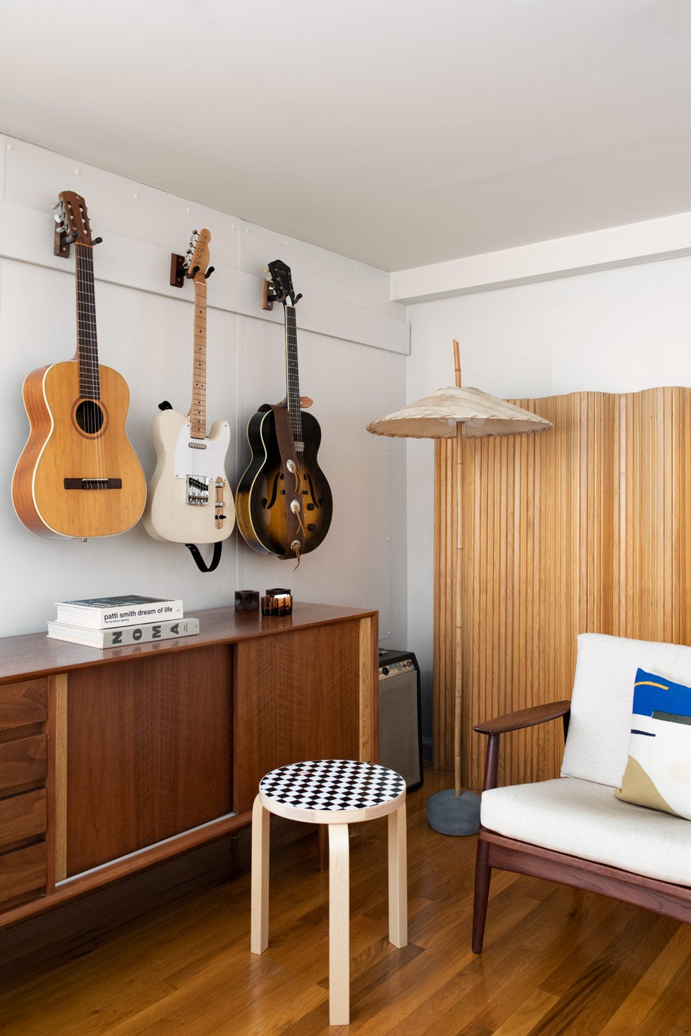 Music room with hung guitars