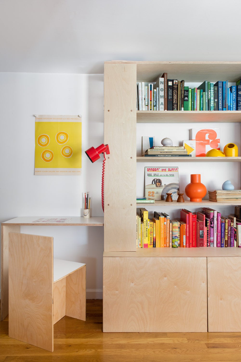 Plywood chair and bookcase with colorful books