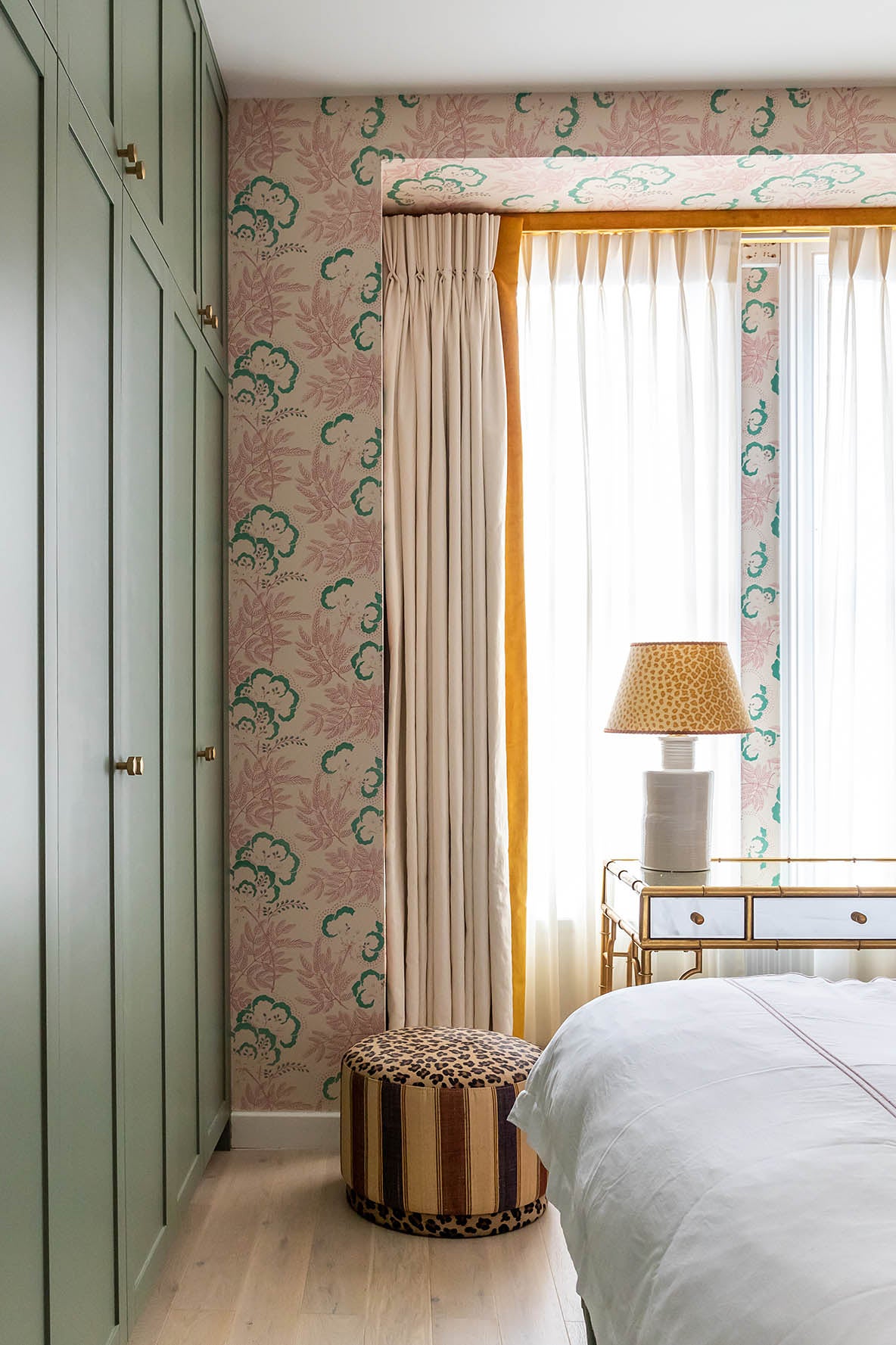 Pink and green traditional bedroom