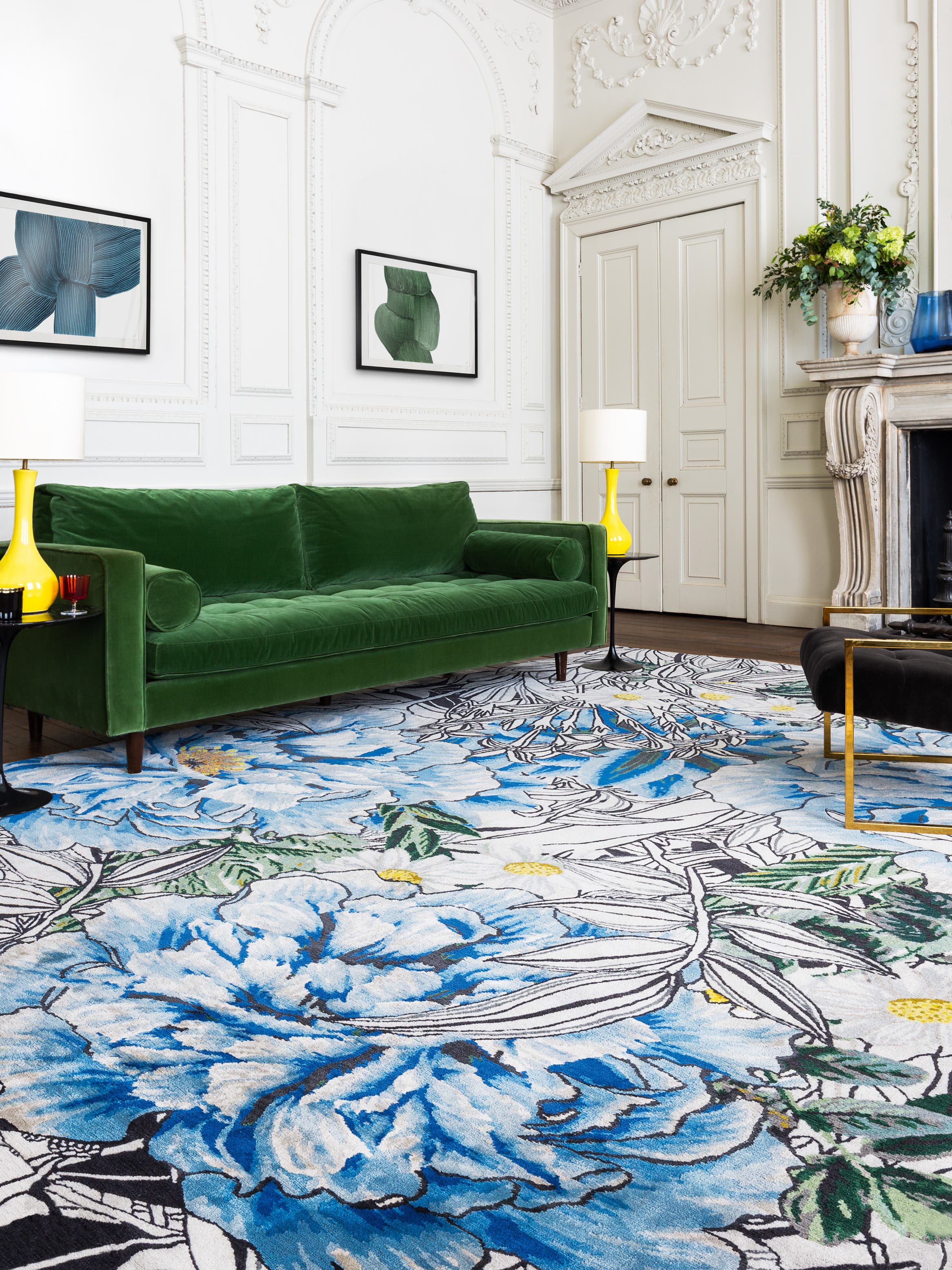 blue floral rug and green sofa