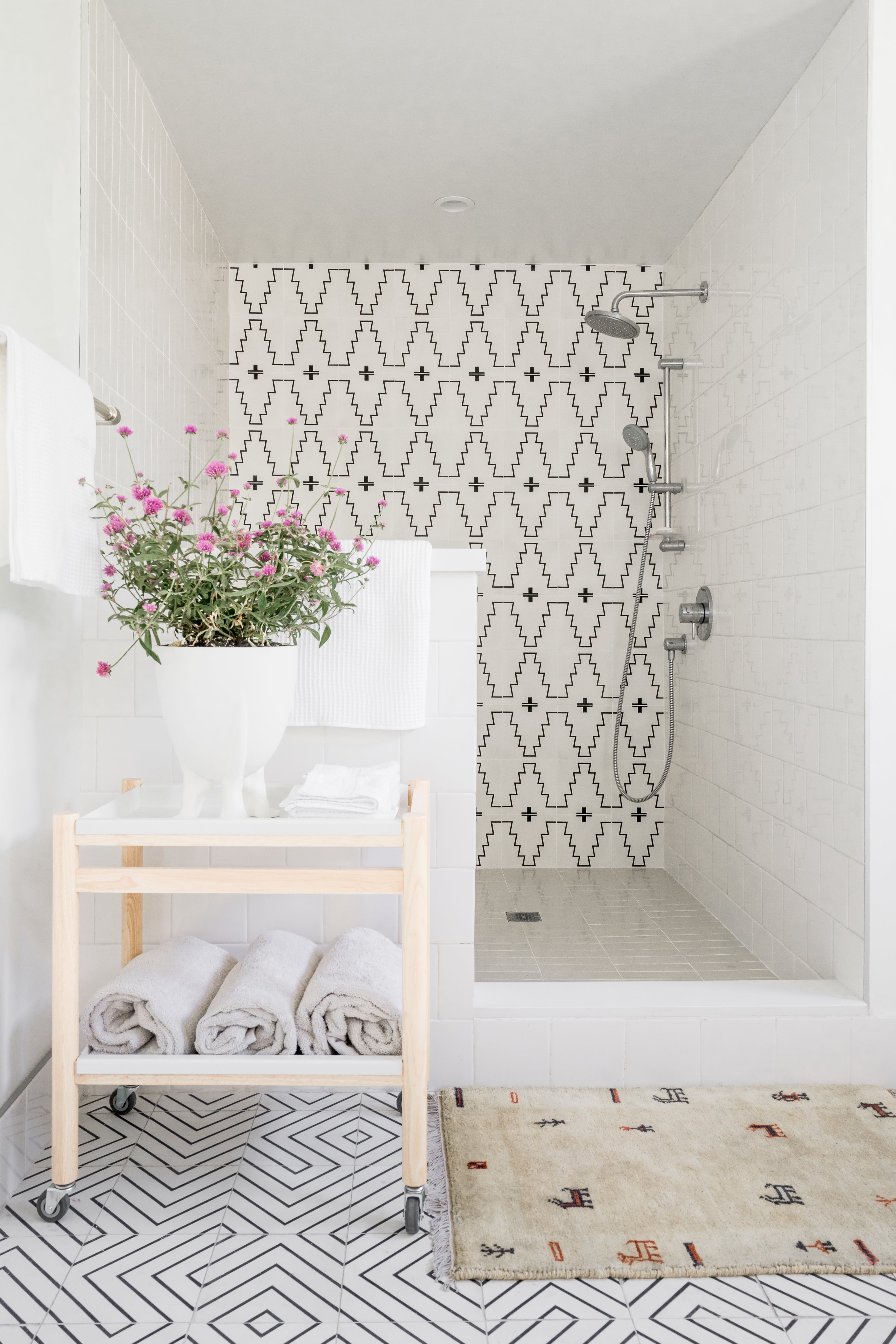 Bathroom with black and white tile