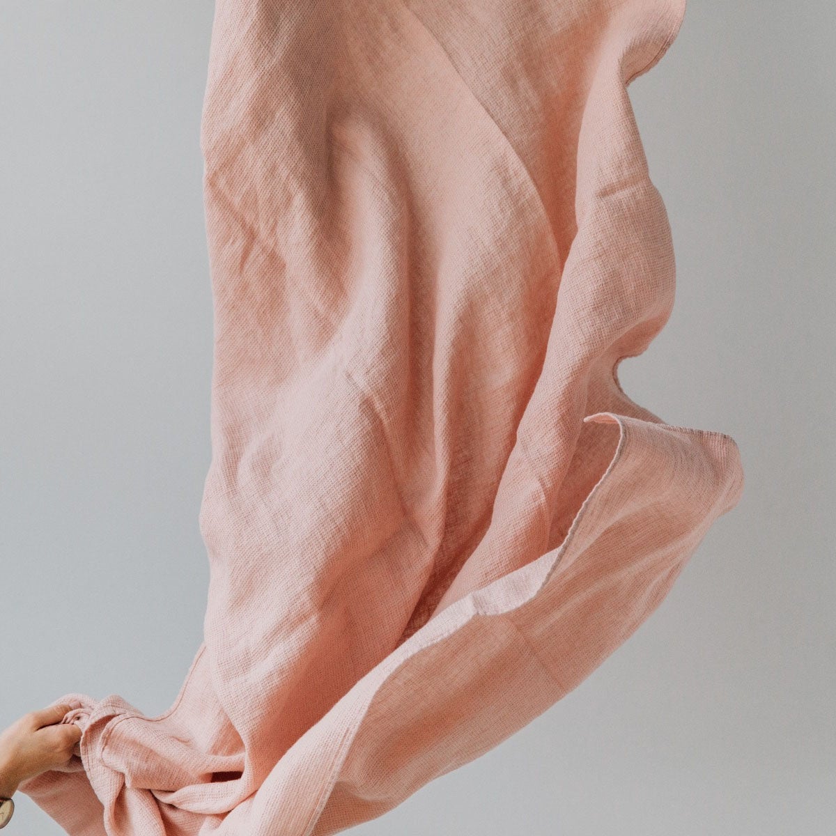 nude pink linen throw