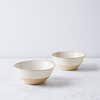two neutral stoneware bowls