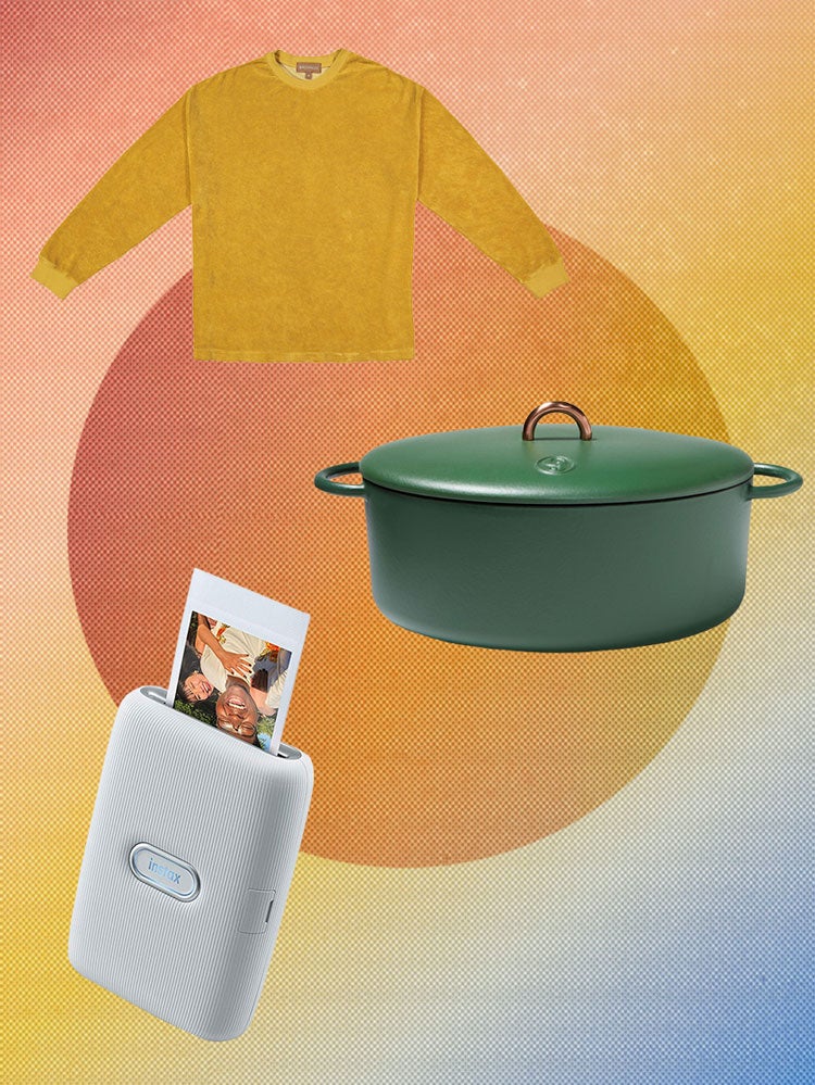 a pot and sweater on a reainbow background