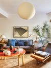 Blue pillows and Noguchi lantern in living room