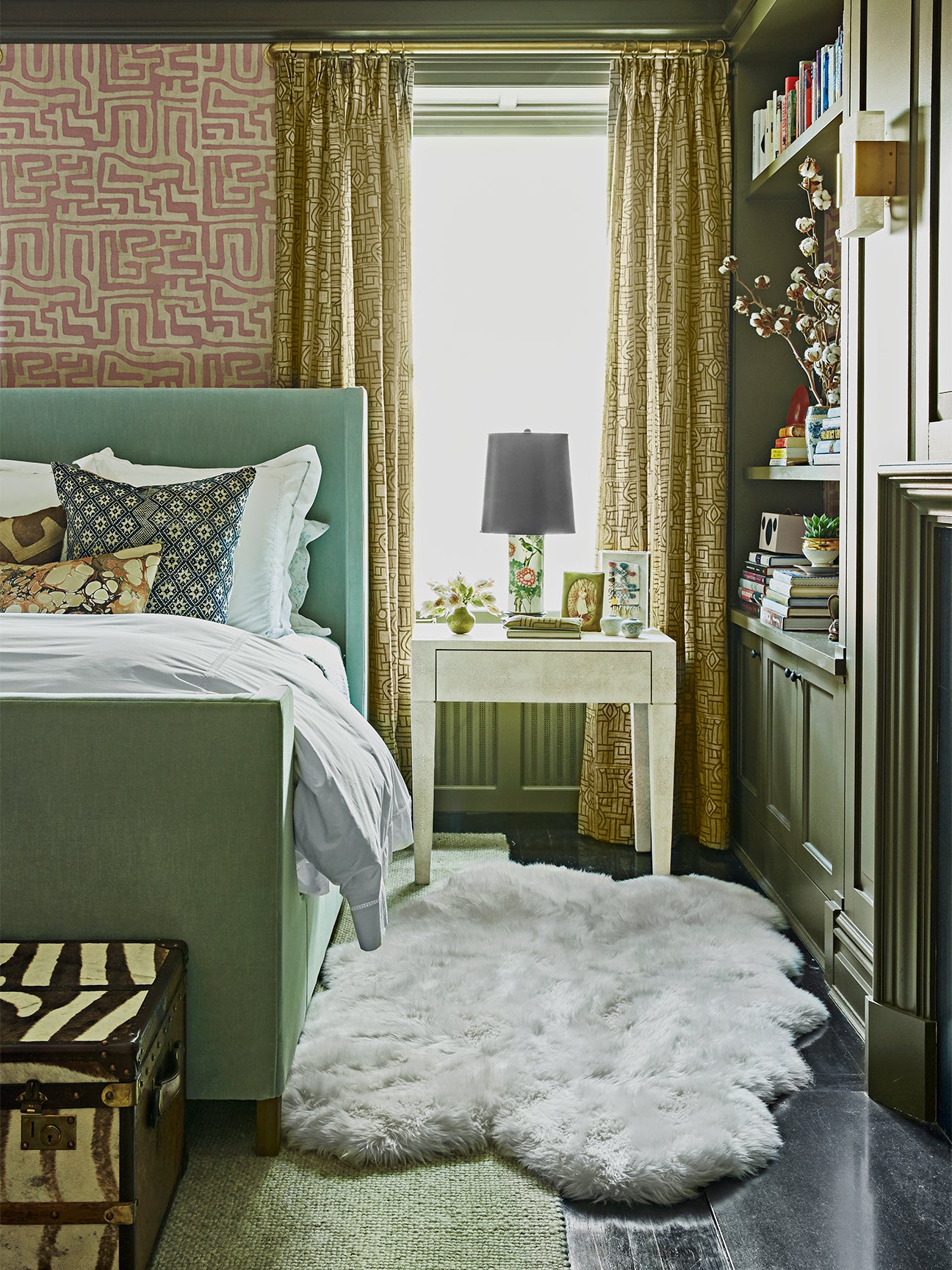 Green Bedroom With White Sheepskin Rug