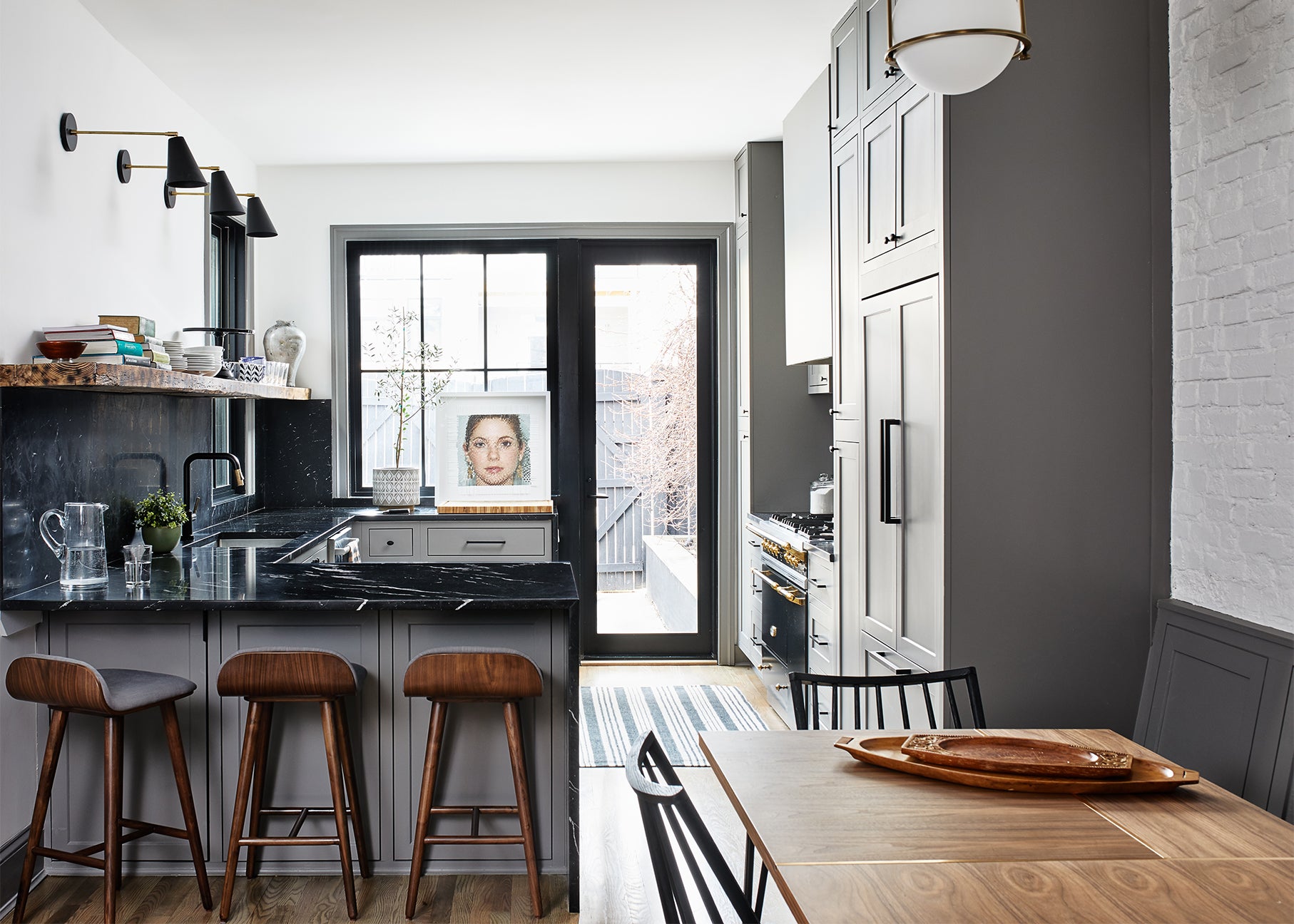 Gray kitchen with wood counter stools