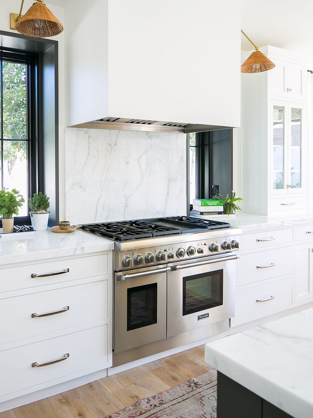 large hood with white cabinets
