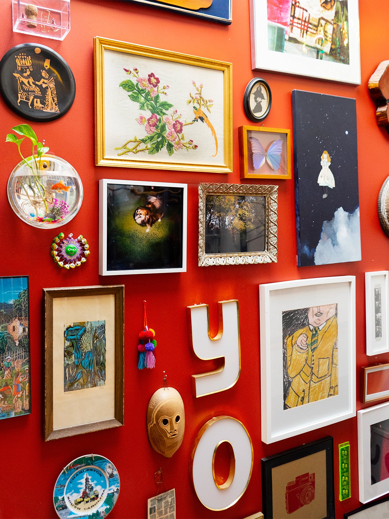 red gallery wall with images