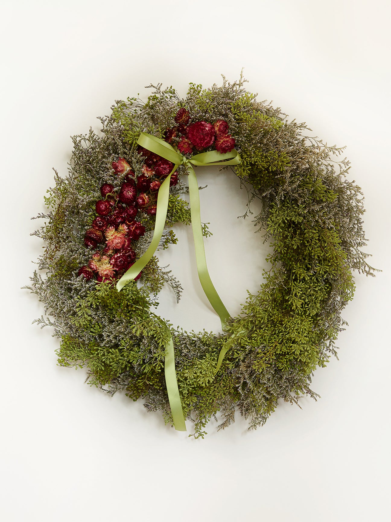 green and red winter wreath