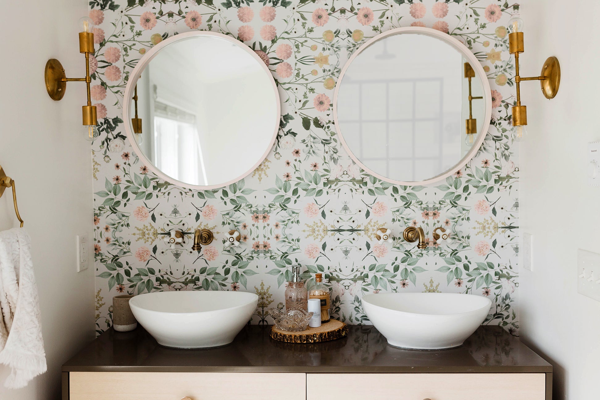floral wallpaper with a large dresser-turned-vanity