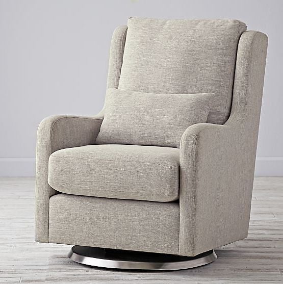 Gray upholstered rocking chair