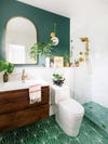 green bathroom with plants