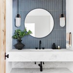blue bathroom tile with white marble floating vanity