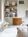warm gray kitchen with a farmhouse sink