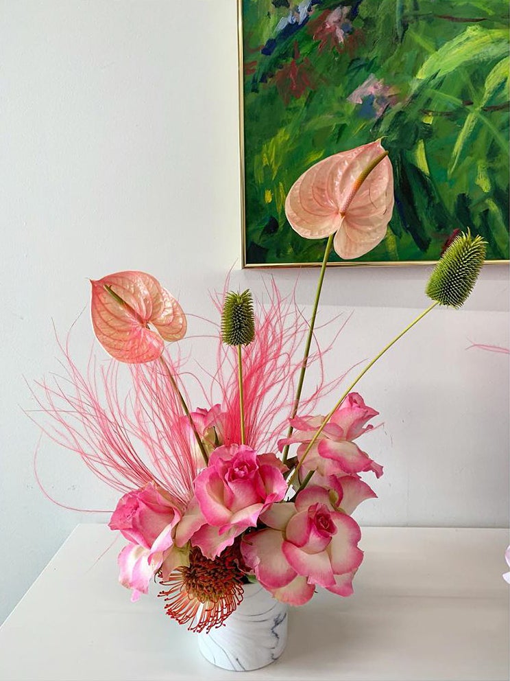 pink floral arrangement on a table