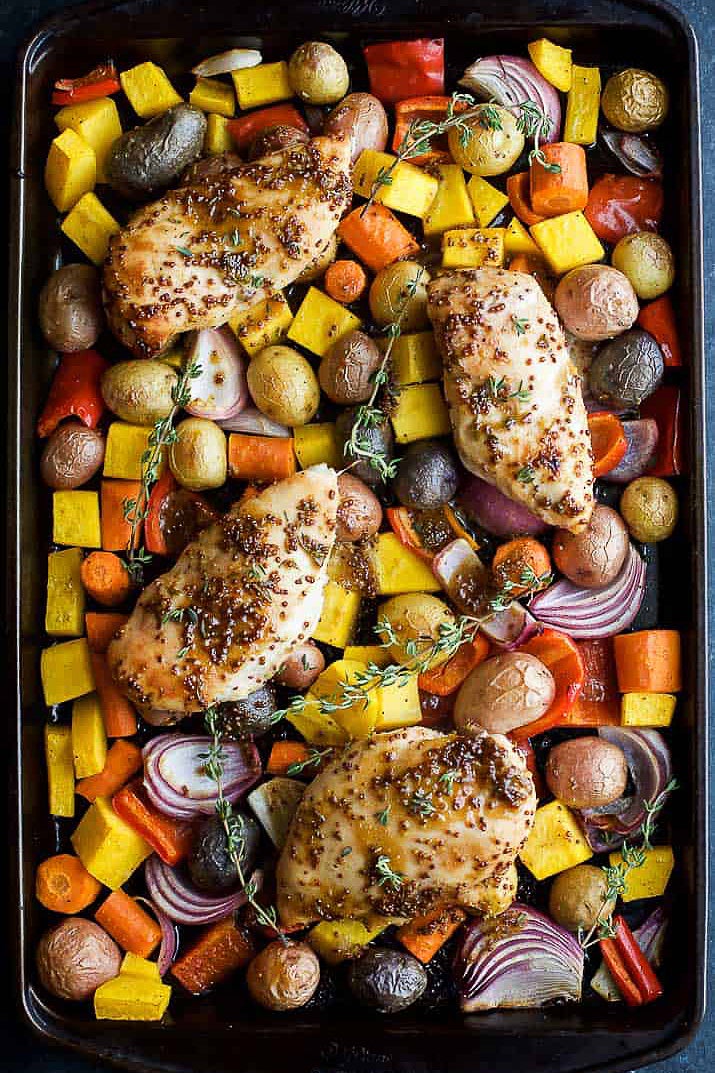 honey mustard chicken with vegetables on a sheet pan