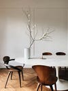 large oversize branch on dining table