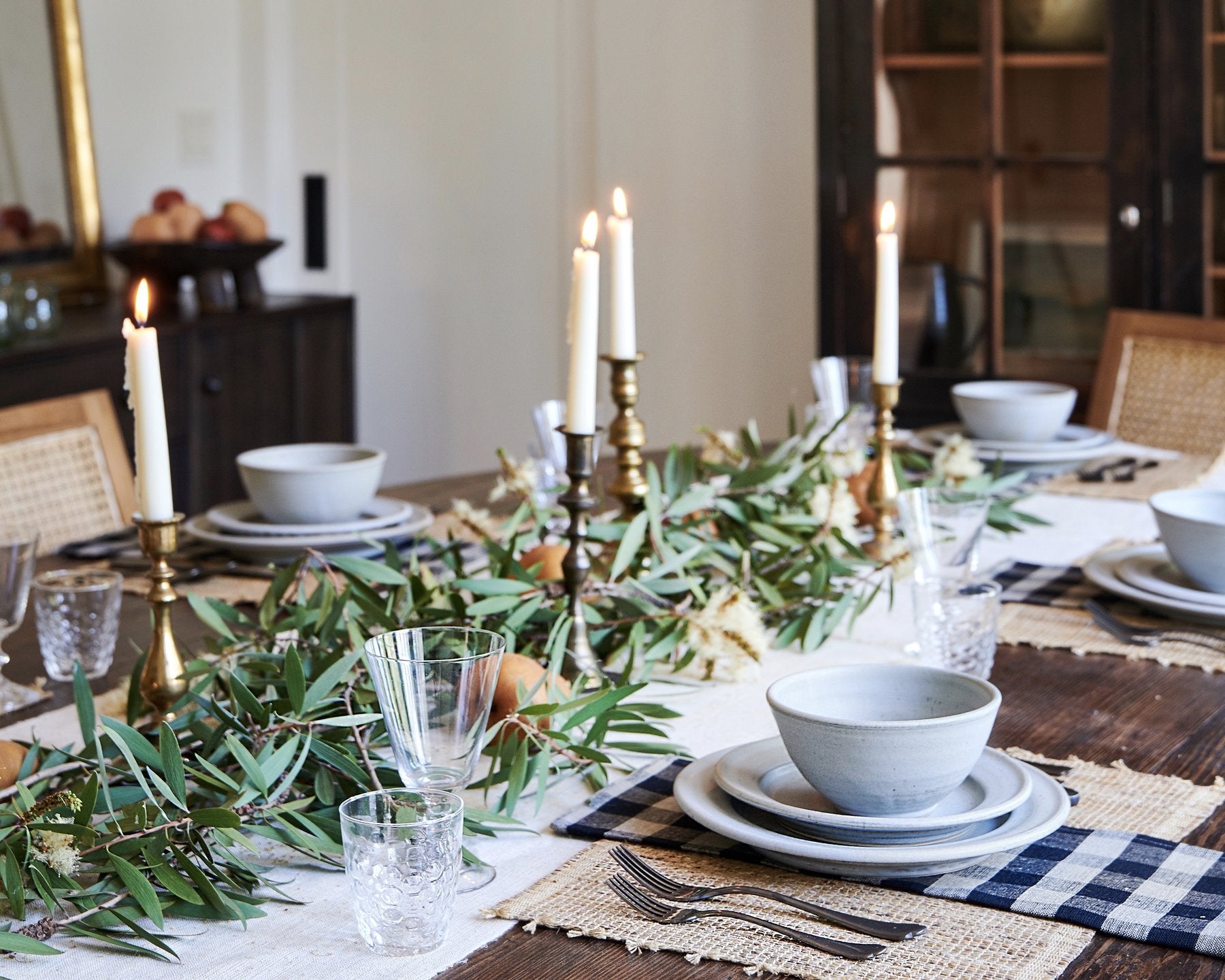 dining table with ruscus leaves